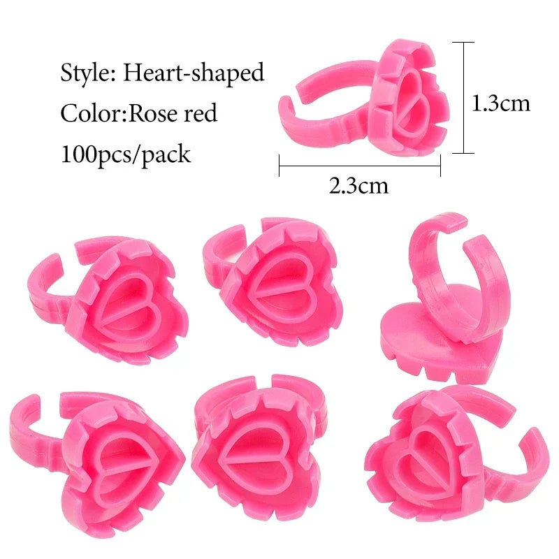 vvocci 100 PCS Heart-shaped Glue Ring Cup Disposable Plastic Eyelash Extension Tattoo Pigment Holder Pallet Lash Makeup Tools Quake M45 Rose Red