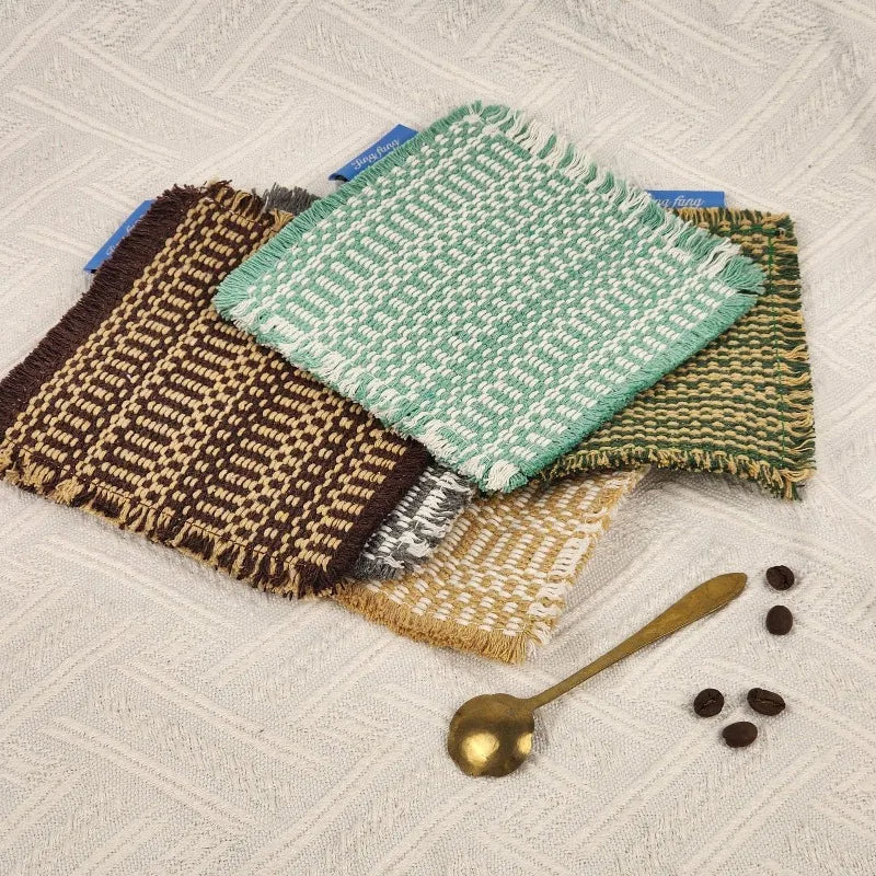 Vintage-inspired, tassel-trimmed woven coasters. checkered square fabric trivets, perfect for coffee, tea, and more Quake