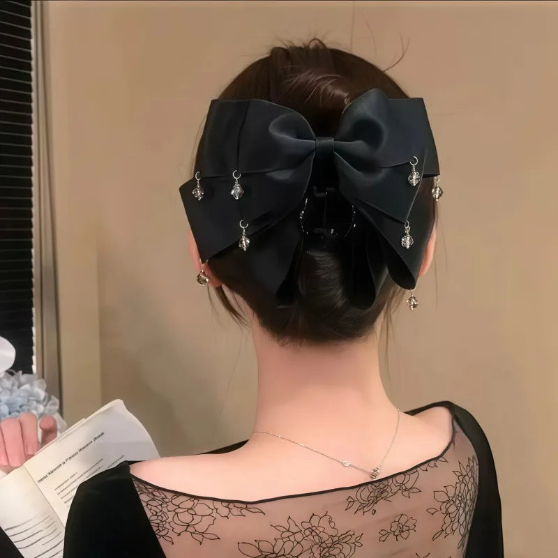 Elegant Sparkling Bow Hair Claw with Dangling Crystal Charms for Women Stylish Hair Accessory for Evening Parties and Daily Look Quake