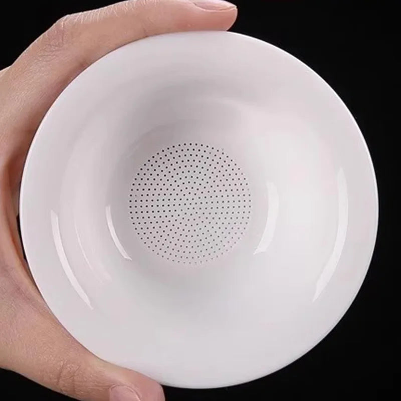 Mutton fat jade white porcelain all-in-one full ceramic hole tea drain ceramic tea set accessories tea filter tea maker Quake