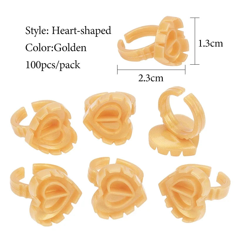 vvocci 100 PCS Heart-shaped Glue Ring Cup Disposable Plastic Eyelash Extension Tattoo Pigment Holder Pallet Lash Makeup Tools Quake M45 Gold