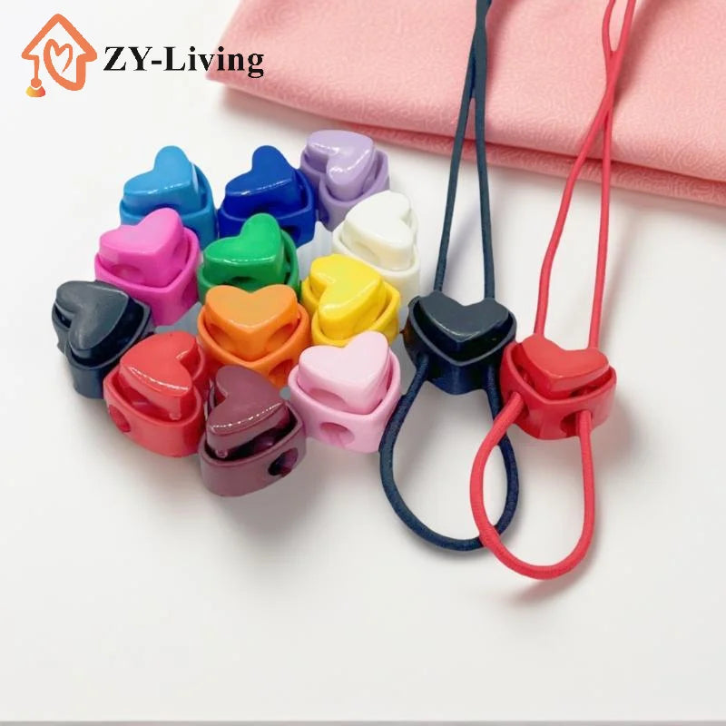 5Pcs Colorful Garment Stoppers Heart-Shaped Plastic Cord Locks Double Hole Spring Toggle Anti-slip Stoppers Garment Accessories Quake