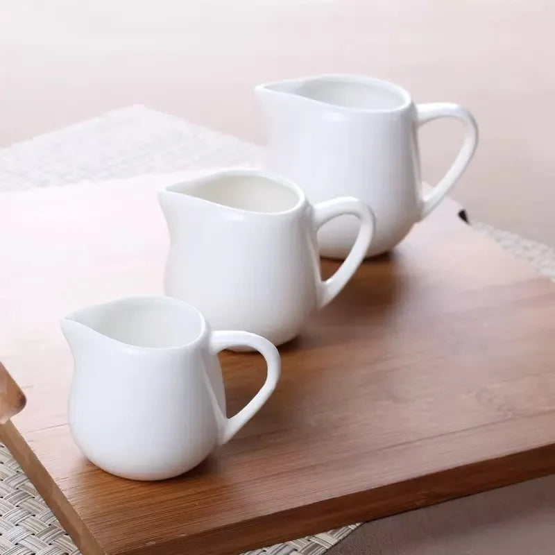 YWDL 50/100/220ML Ceramic Milk Jug Espresso Coffee Cream Jugs Kitchen Sauce Cup Serving Pitcher White Heat-resistant Milk Cup Quake