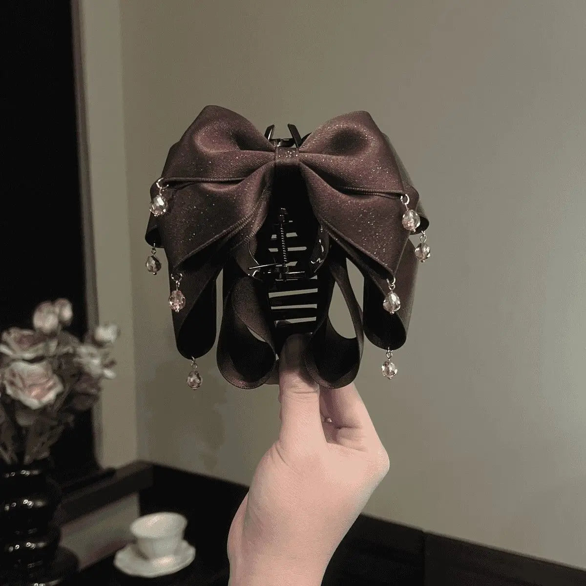 Elegant Sparkling Bow Hair Claw with Dangling Crystal Charms for Women Stylish Hair Accessory for Evening Parties and Daily Look Quake brown