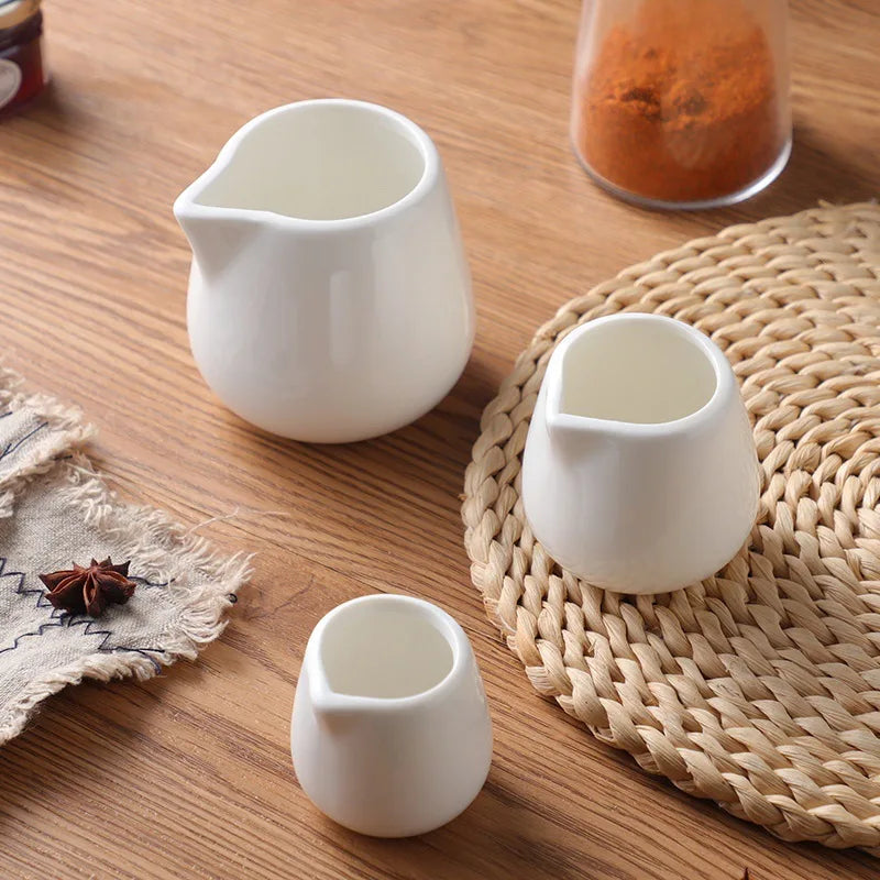 YWDL 50/100/220ML Ceramic Milk Jug Espresso Coffee Cream Jugs Kitchen Sauce Cup Serving Pitcher White Heat-resistant Milk Cup Quake