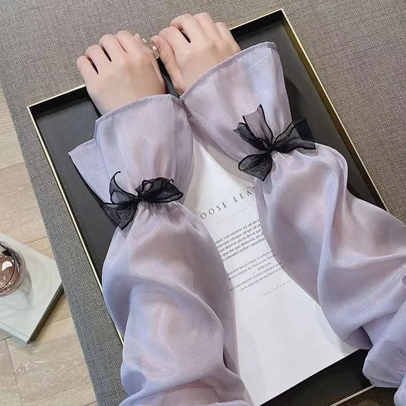 Elegant Sheer Arm Sleeves with Black Bow Decor Sweet Feminine Sun Protection Accessory for Dresses and Outfits Quake