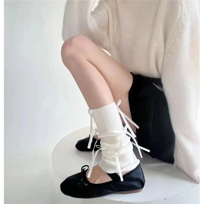 A Pair of Ballet Style Sweet Lolita Socks with Knitted Bow and Mid Leg Socks Paired with Lolita Clothing Quake