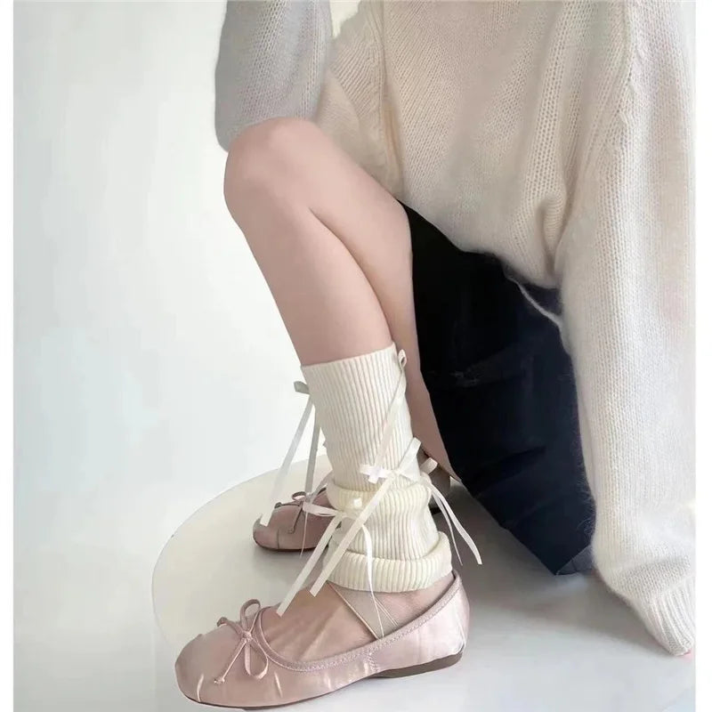 A Pair of Ballet Style Sweet Lolita Socks with Knitted Bow and Mid Leg Socks Paired with Lolita Clothing Quake