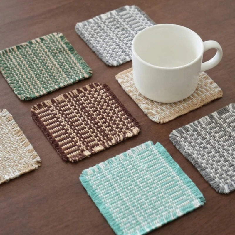 Vintage-inspired, tassel-trimmed woven coasters. checkered square fabric trivets, perfect for coffee, tea, and more Quake