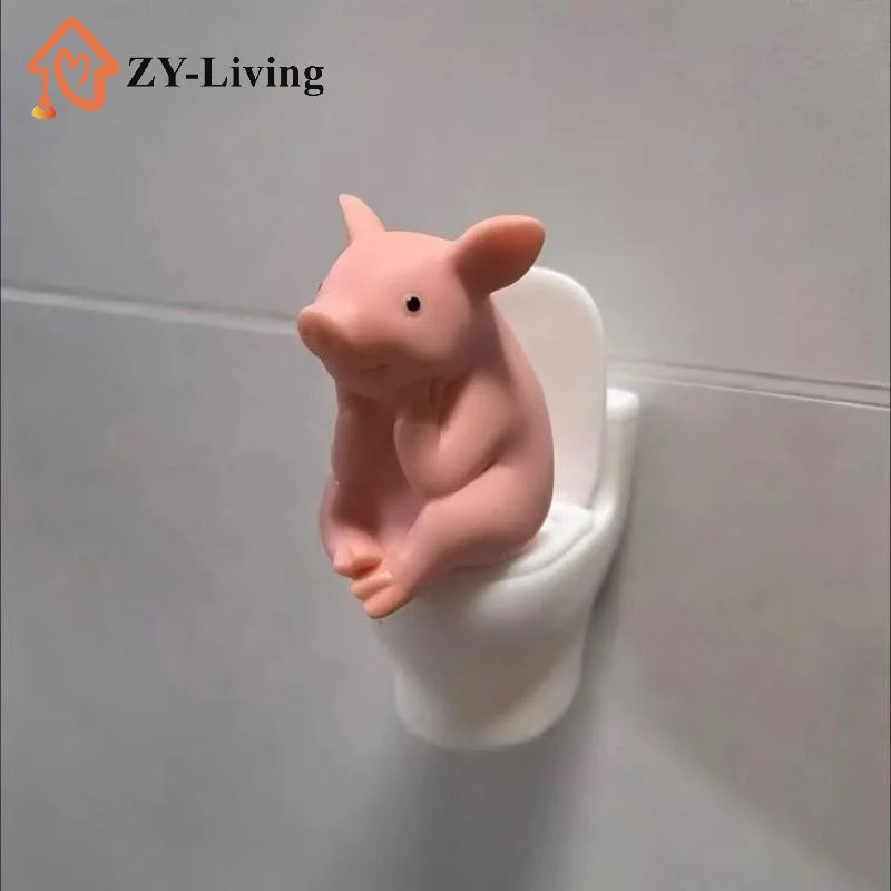 Cartoon Pig Sitting on Toilet Figurine Pink Plastic Miniature Animal Desktop Ornament for Home Office Shelf Room Decoration Quake
