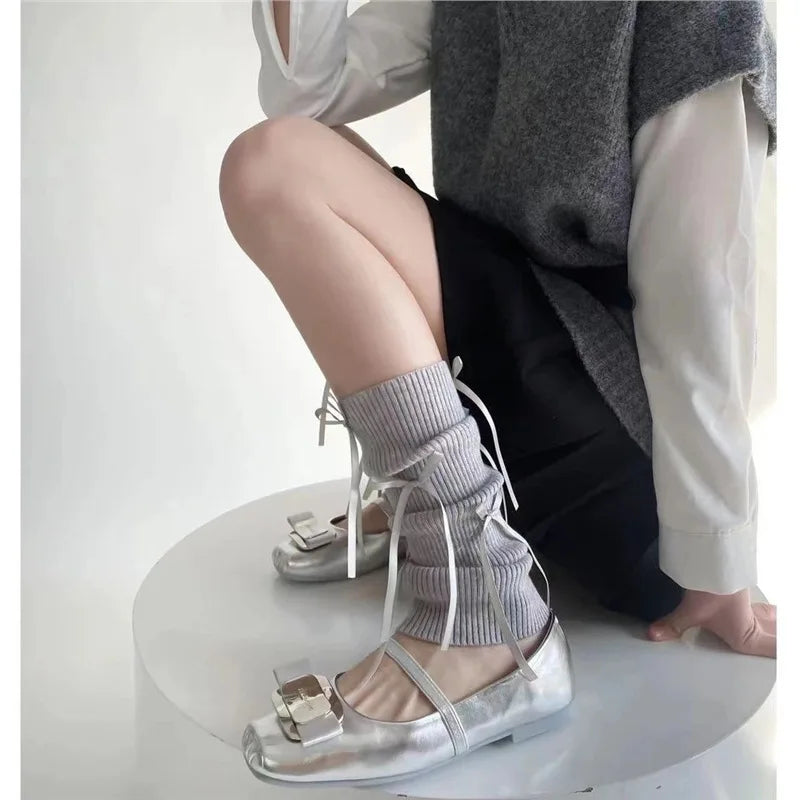 A Pair of Ballet Style Sweet Lolita Socks with Knitted Bow and Mid Leg Socks Paired with Lolita Clothing Quake