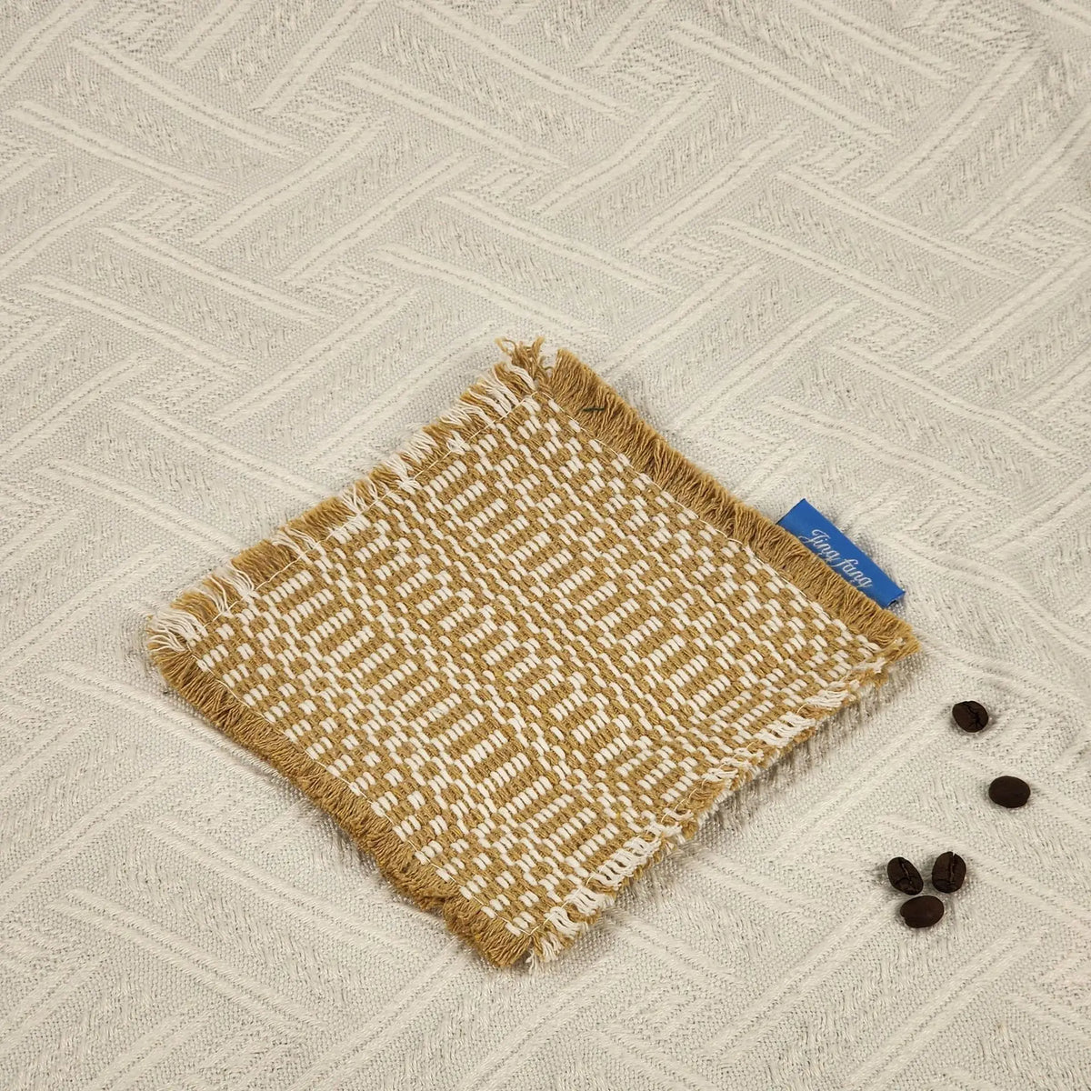 Vintage-inspired, tassel-trimmed woven coasters. checkered square fabric trivets, perfect for coffee, tea, and more Quake Apricot