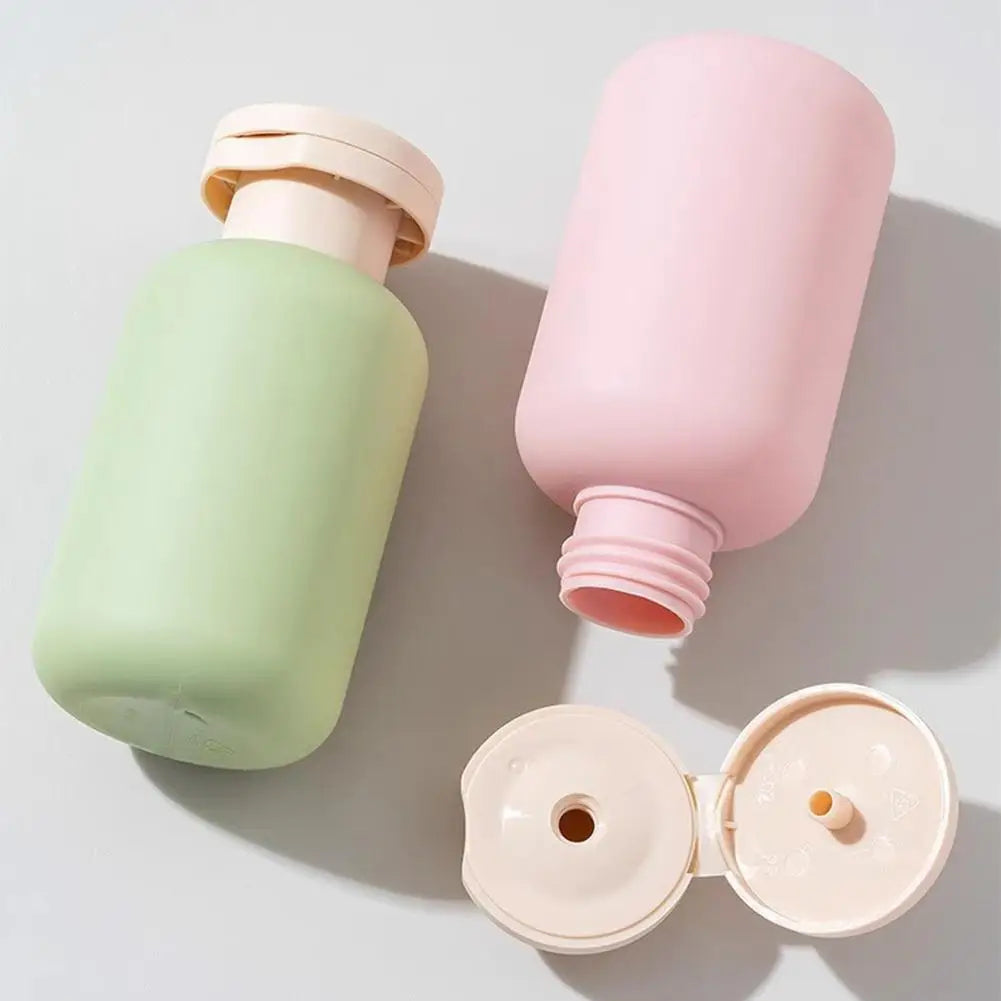 Portable Travel Squeeze Bottles Refillable Empty Containers for Shampoo Lotion Liquid Leak-proof TSA Approved Cosmetic Bottles Quake