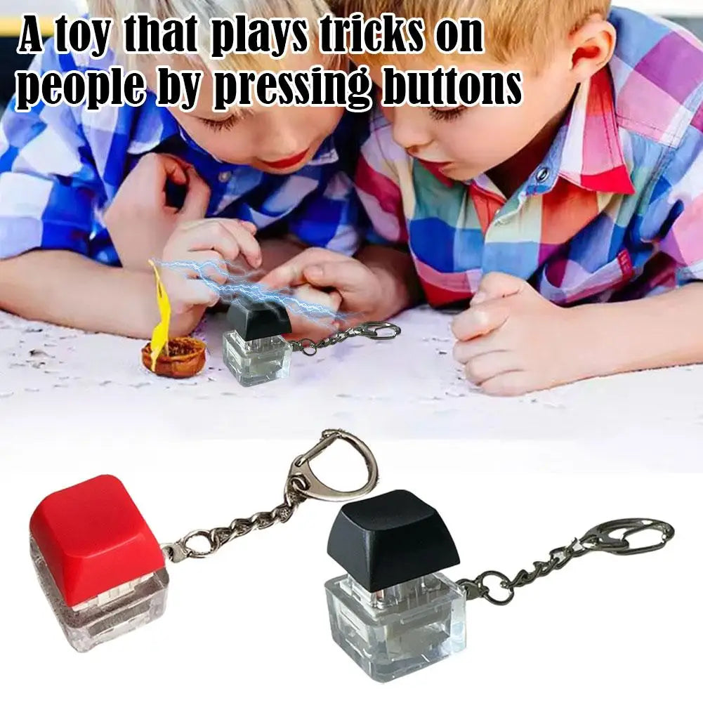 Electric Shock Prank Button Toy that plays tricks on people by pressing buttons Realistic Touch Keychain Pendant Stress Relief Quake