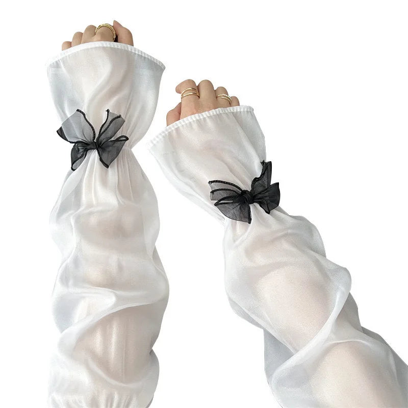 Elegant Sheer Arm Sleeves with Black Bow Decor Sweet Feminine Sun Protection Accessory for Dresses and Outfits Quake