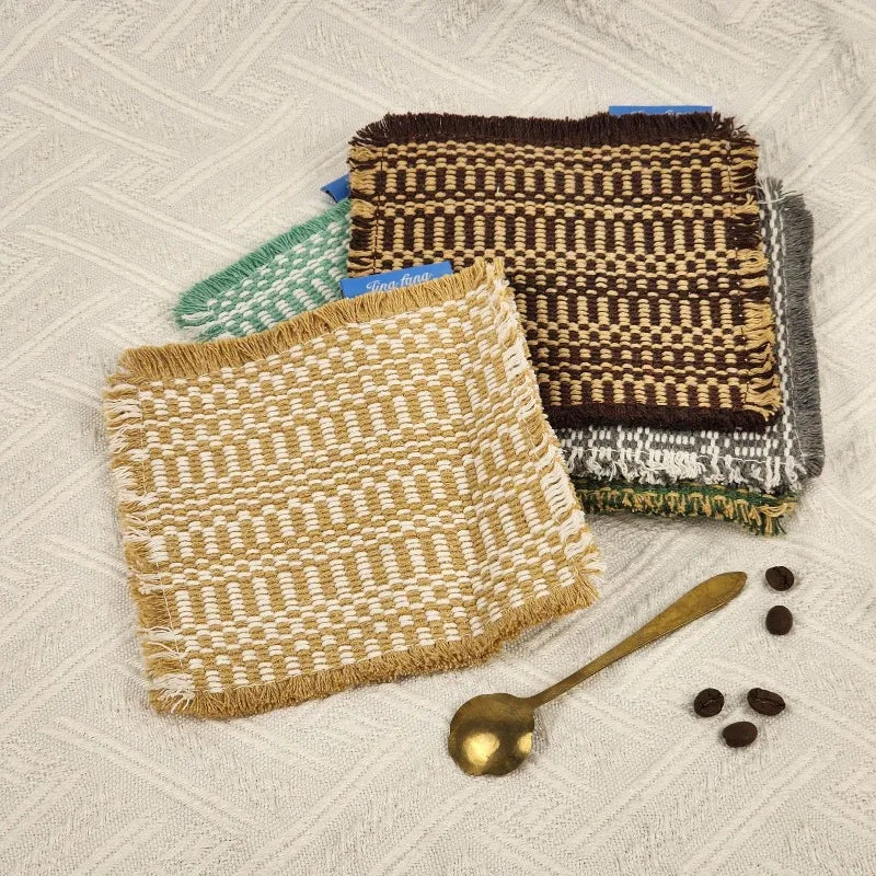Vintage-inspired, tassel-trimmed woven coasters. checkered square fabric trivets, perfect for coffee, tea, and more Quake