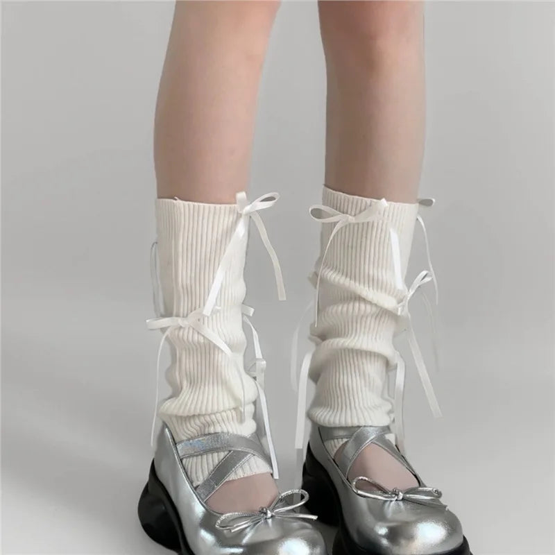 A Pair of Ballet Style Sweet Lolita Socks with Knitted Bow and Mid Leg Socks Paired with Lolita Clothing Quake
