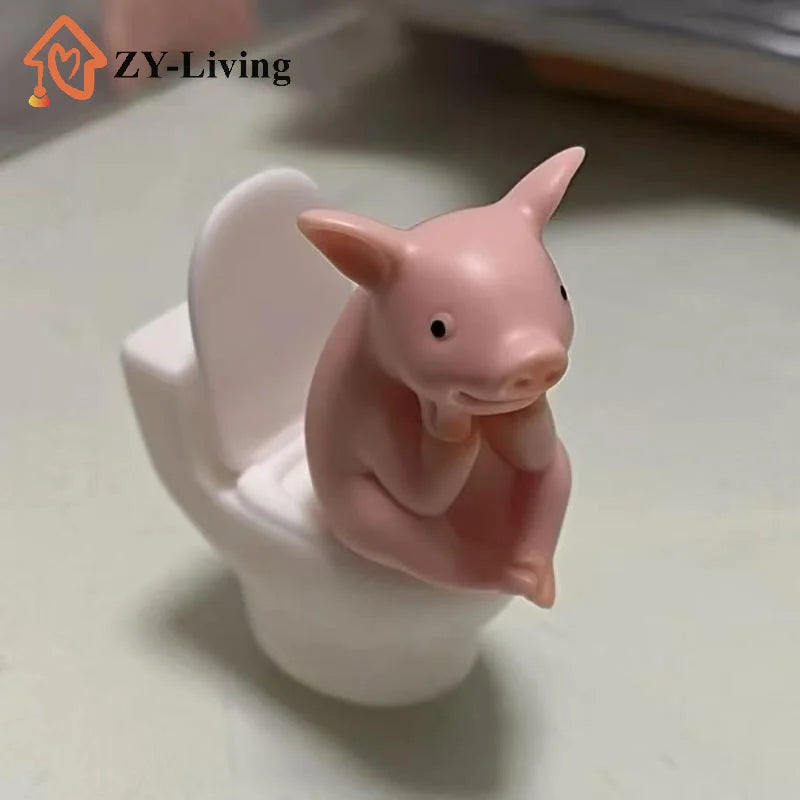 Cartoon Pig Sitting on Toilet Figurine Pink Plastic Miniature Animal Desktop Ornament for Home Office Shelf Room Decoration Quake