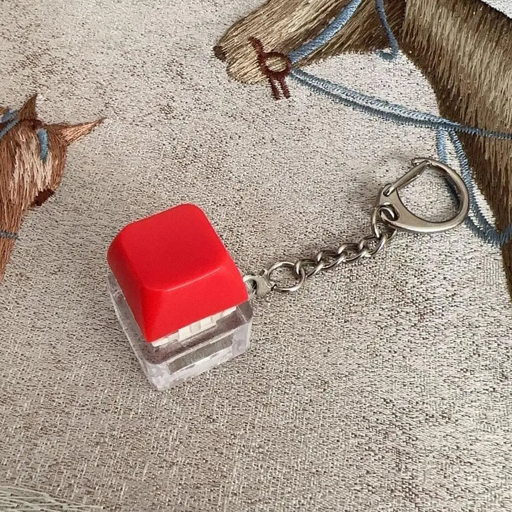 Electric Shock Prank Button Toy that plays tricks on people by pressing buttons Realistic Touch Keychain Pendant Stress Relief Quake