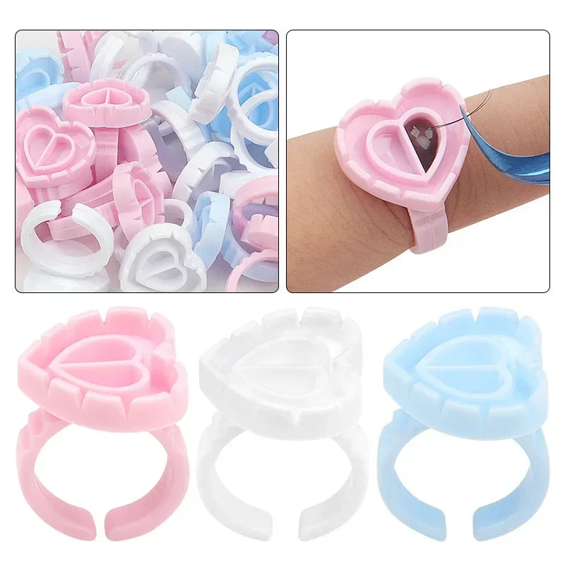 vvocci 100 PCS Heart-shaped Glue Ring Cup Disposable Plastic Eyelash Extension Tattoo Pigment Holder Pallet Lash Makeup Tools Quake