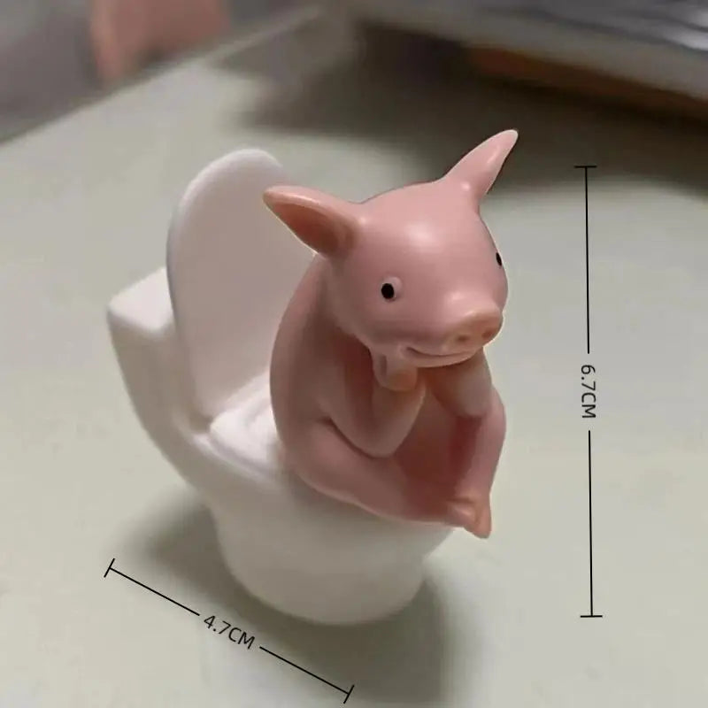 Cartoon Pig Sitting on Toilet Figurine Pink Plastic Miniature Animal Desktop Ornament for Home Office Shelf Room Decoration Quake 1Pcs